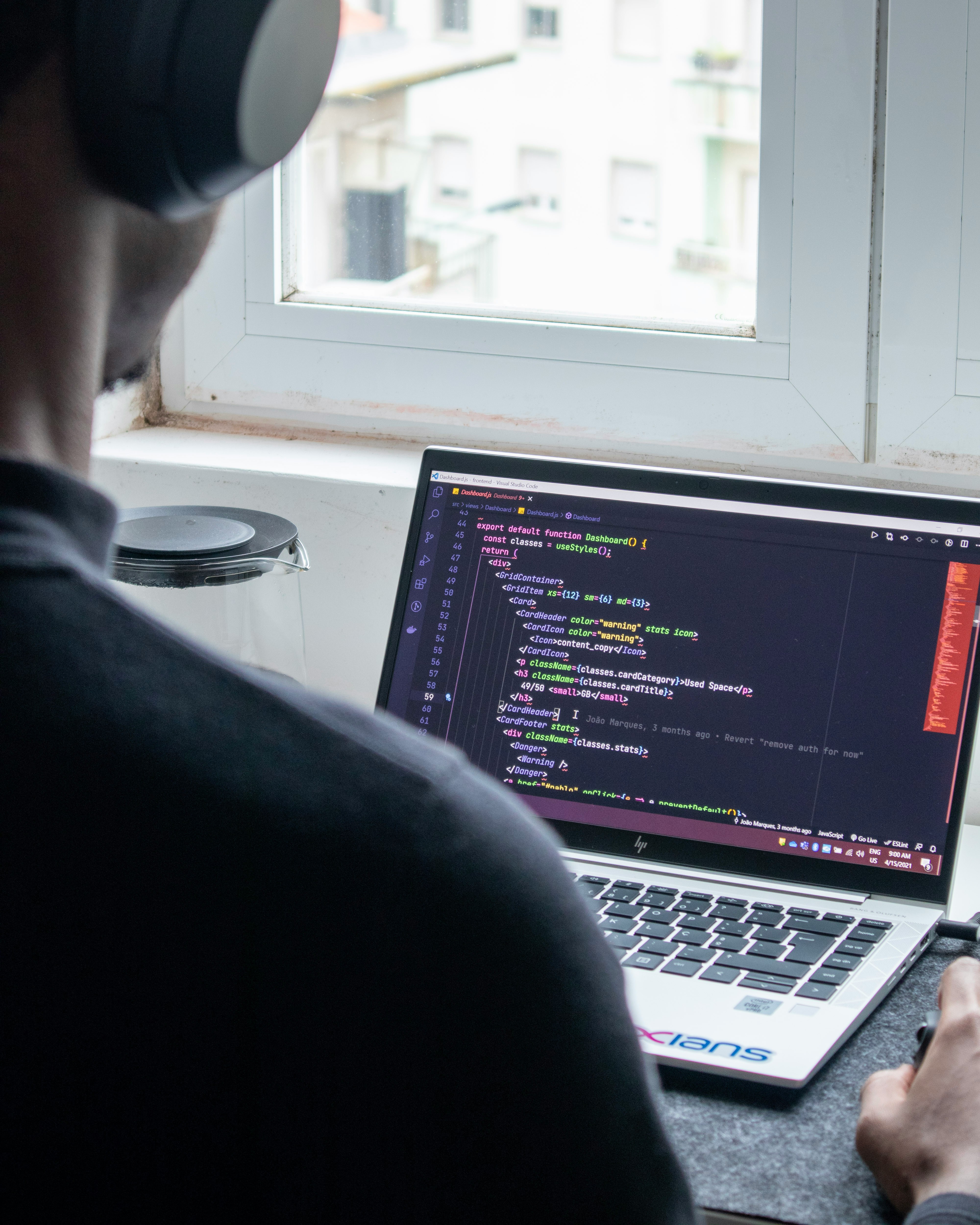Mobile developer working on code
